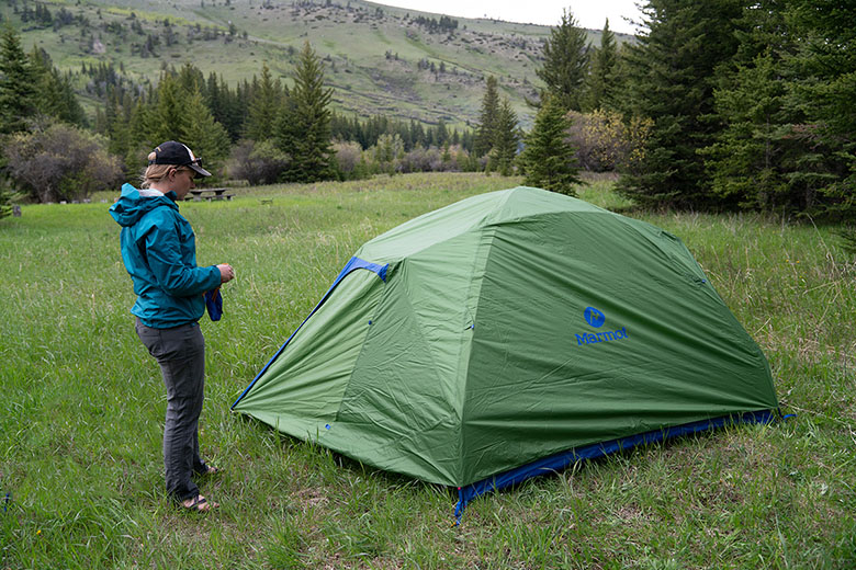 Marmot Tungsten 4P camping tent (standing next to tent)